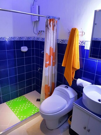 Imagen de la habitación del Hotel Mango's Beachfront Resort. Foto 20