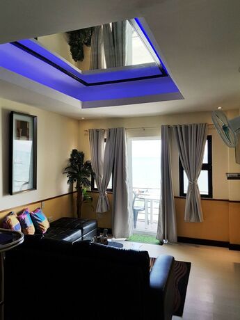 Imagen de la habitación del Hotel Mango's Beachfront Resort. Foto 22