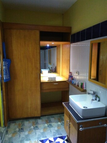 Imagen de la habitación del Hotel Mango's Beachfront Resort. Foto 26
