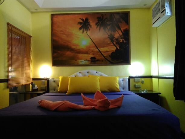 Imagen de la habitación del Hotel Mango's Beachfront Resort. Foto 31
