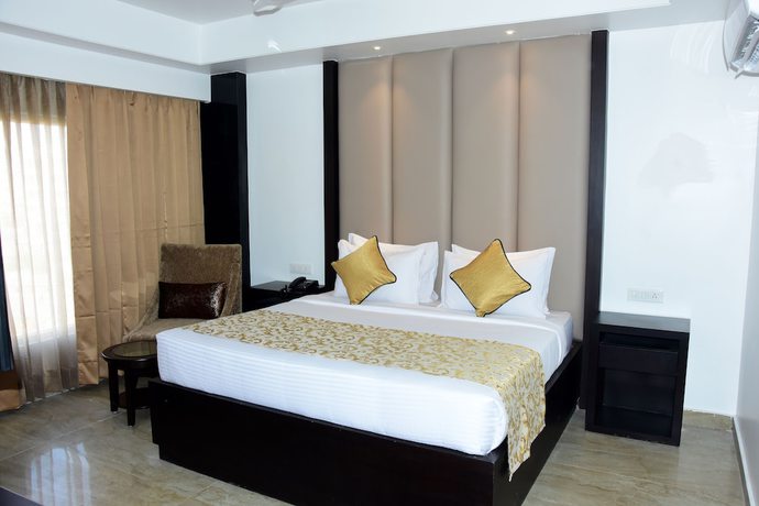 Imagen de la habitación del Hotel Mangos Haridwar. Foto 10