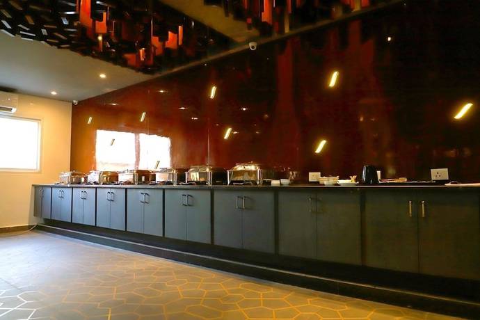 Imagen del bar/restaurante del Hotel Mangos Haridwar. Foto 9