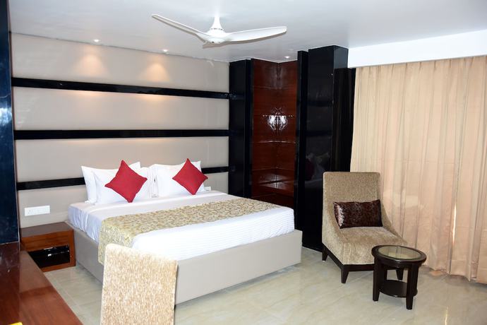 Imagen de la habitación del Hotel Mangos Haridwar. Foto 14