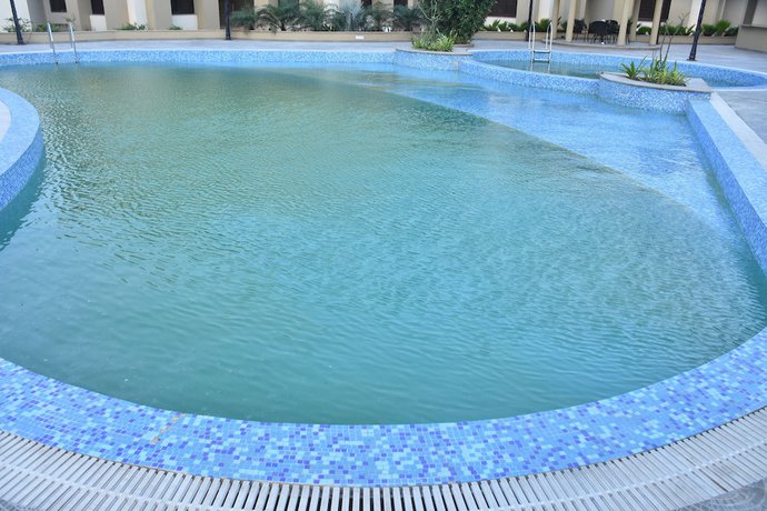 Imagen de la piscina del Hotel Mangos Select Dwarka. Foto 20
