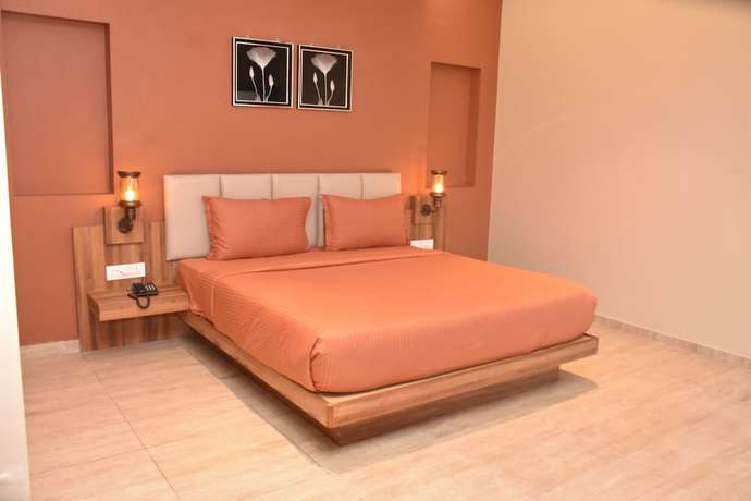 Imagen de la habitación del Hotel Mangos Select Dwarka. Foto 9