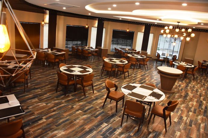 Imagen del bar/restaurante del Hotel Mangos Select Dwarka. Foto 3
