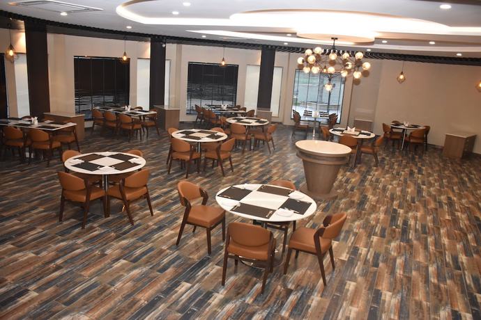 Imagen del bar/restaurante del Hotel Mangos Select Dwarka. Foto 4