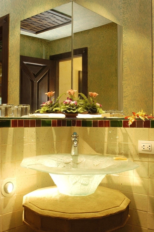 Imagen de la habitación del Hotel Mangosteen Ayurveda and Wellness Resort. Foto 6
