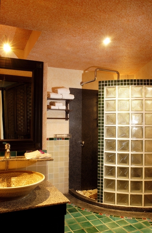 Imagen de la habitación del Hotel Mangosteen Ayurveda and Wellness Resort. Foto 10