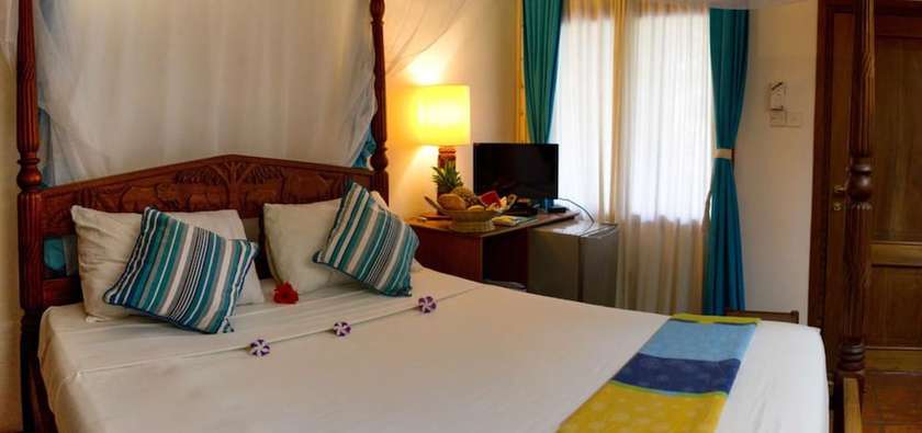Imagen de la habitación del Hotel Mangro Diani Beach. Foto 7