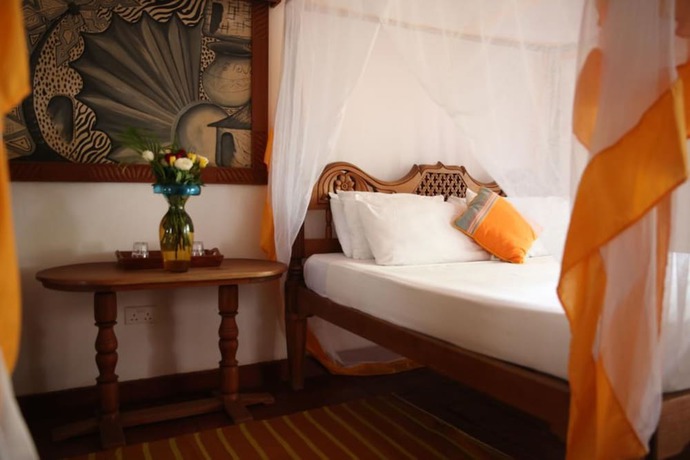 Imagen de la habitación del Hotel Mangro Diani Beach. Foto 9