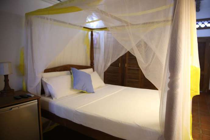 Imagen de la habitación del Hotel Mangro Diani Beach. Foto 10