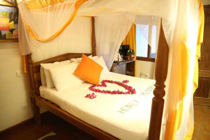 Imagen de la habitación del Hotel Mangro Diani Beach. Foto 12