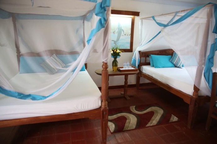 Imagen de la habitación del Hotel Mangro Diani Beach. Foto 14