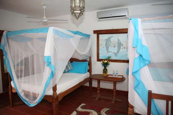 Imagen de la habitación del Hotel Mangro Diani Beach. Foto 15