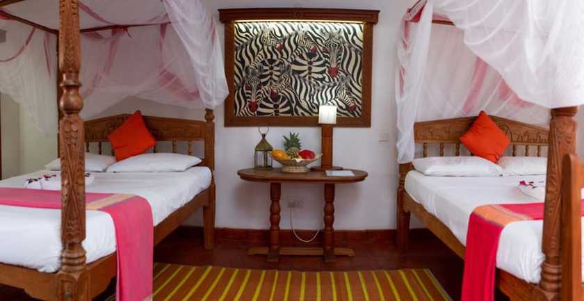 Imagen de la habitación del Hotel Mangro Diani Beach. Foto 16