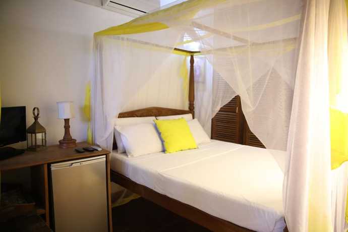 Imagen de la habitación del Hotel Mangro Diani Beach. Foto 17