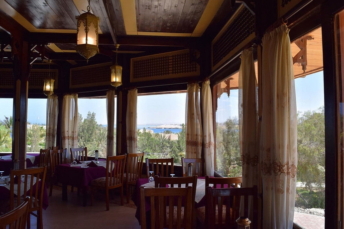 Imagen del bar/restaurante del Hotel Mangrove Bay Resort. Foto 5