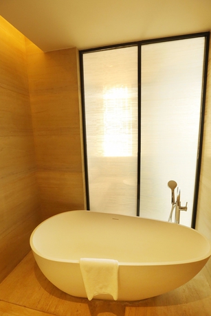 Imagen de la habitación del Hotel Mangrove Tree Resort World Qingdao. Foto 2