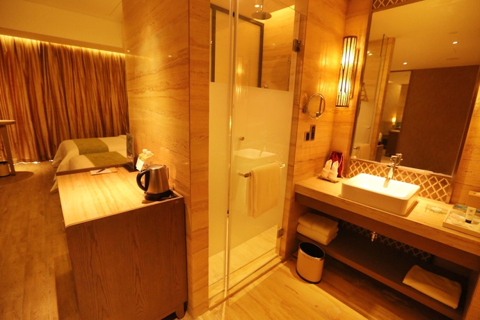 Imagen de la habitación del Hotel Mangrove Tree Resort World Qingdao. Foto 3