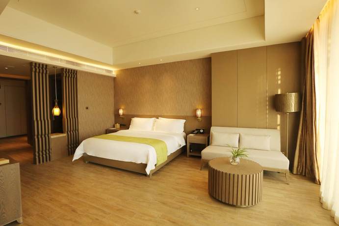 Imagen de la habitación del Hotel Mangrove Tree Resort World Qingdao. Foto 7
