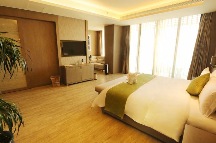 Imagen de la habitación del Hotel Mangrove Tree Resort World Qingdao. Foto 10