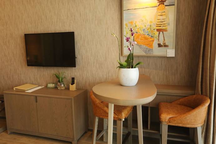 Imagen de la habitación del Hotel Mangrove Tree Resort World Qingdao. Foto 11