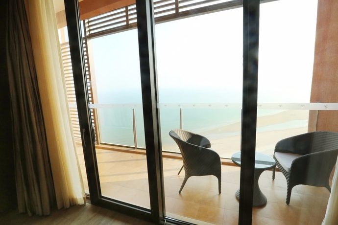 Imagen de la habitación del Hotel Mangrove Tree Resort World Qingdao. Foto 12