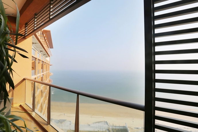 Imagen de la habitación del Hotel Mangrove Tree Resort World Qingdao. Foto 13