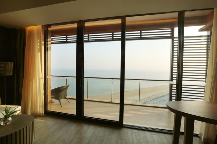 Imagen de la habitación del Hotel Mangrove Tree Resort World Qingdao. Foto 15