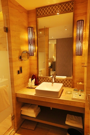 Imagen de la habitación del Hotel Mangrove Tree Resort World Qingdao. Foto 16