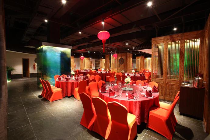 Imagen del bar/restaurante del Hotel Mangrove Tree Resort World Sanya Bay-Coconut. Foto 3