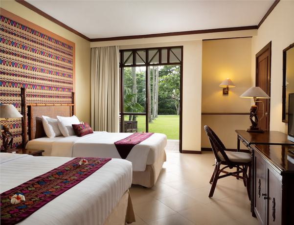Imagen de la habitación del Hotel Mangsit Suites by Holiday Resort Lombok, Dusun Mangsit. Foto 14