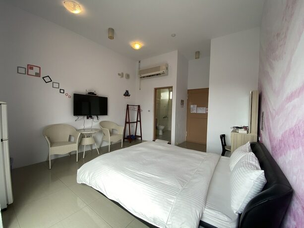 Imagen de la habitación del Hotel Mangyi Inn. Foto 12
