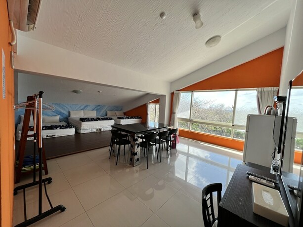 Imagen de la habitación del Hotel Mangyi Inn. Foto 14
