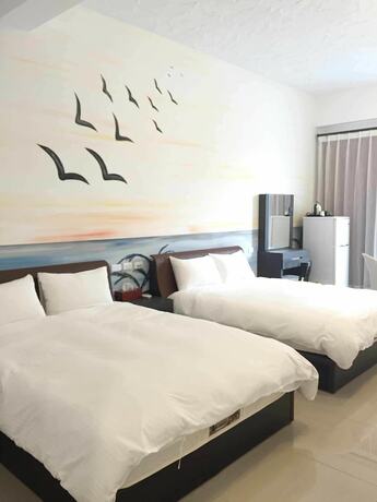 Imagen de la habitación del Hotel Mangyi Inn. Foto 16