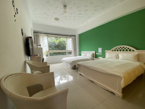 Imagen de la habitación del Hotel Mangyi Inn. Foto 17