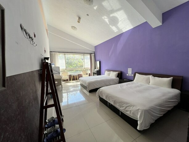 Imagen de la habitación del Hotel Mangyi Inn. Foto 19