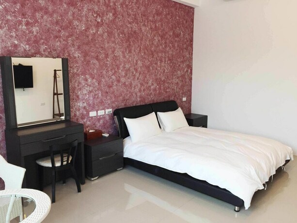 Imagen de la habitación del Hotel Mangyi Inn. Foto 20