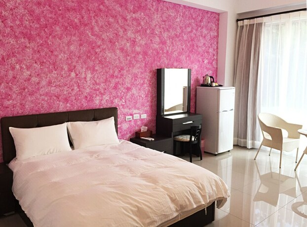 Imagen de la habitación del Hotel Mangyi Inn. Foto 21