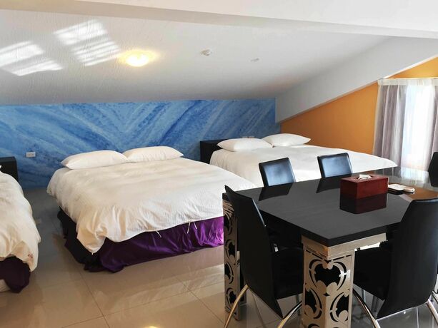 Imagen de la habitación del Hotel Mangyi Inn. Foto 25