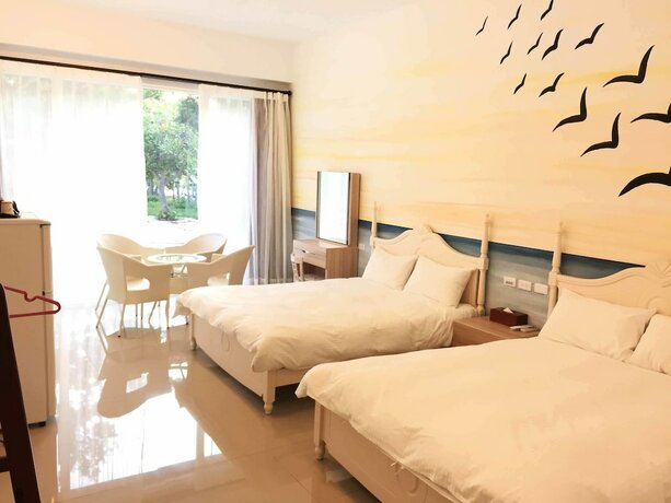 Imagen de la habitación del Hotel Mangyi Inn. Foto 28