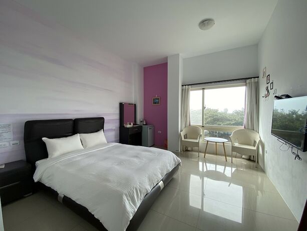 Imagen de la habitación del Hotel Mangyi Inn. Foto 30