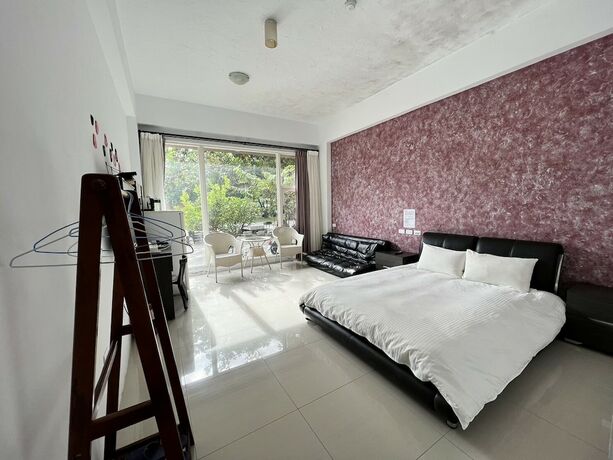 Imagen de la habitación del Hotel Mangyi Inn. Foto 31