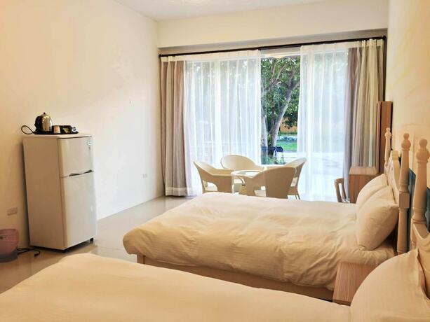 Imagen de la habitación del Hotel Mangyi Inn. Foto 32