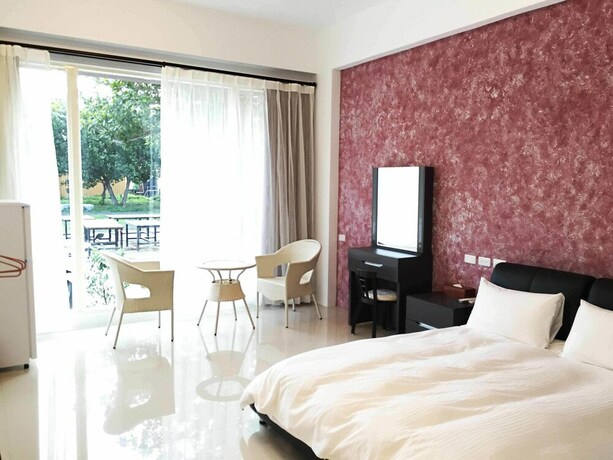 Imagen de la habitación del Hotel Mangyi Inn. Foto 34