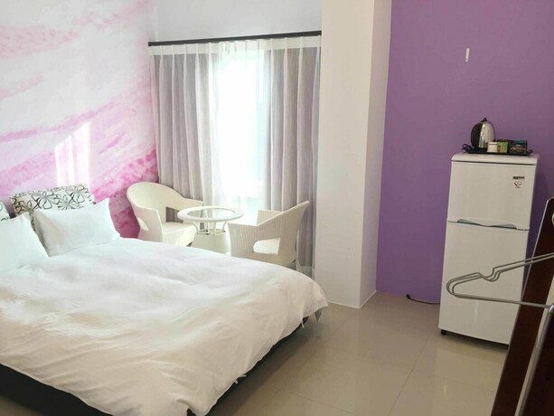 Imagen de la habitación del Hotel Mangyi Inn. Foto 38