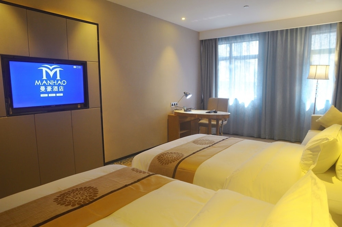 Imagen de la habitación del Hotel Manhao. Foto 11