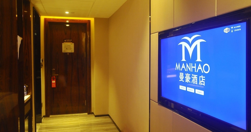 Imagen de la habitación del Hotel Manhao. Foto 14