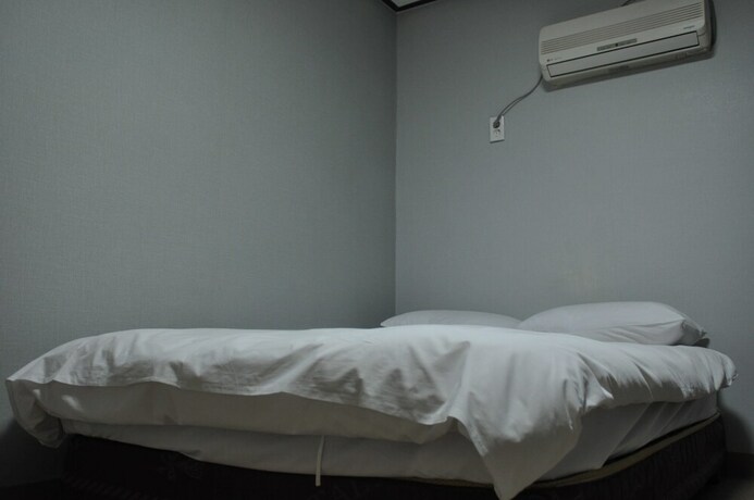 Imagen de la habitación del Hotel Manhattan, Jeju. Foto 12